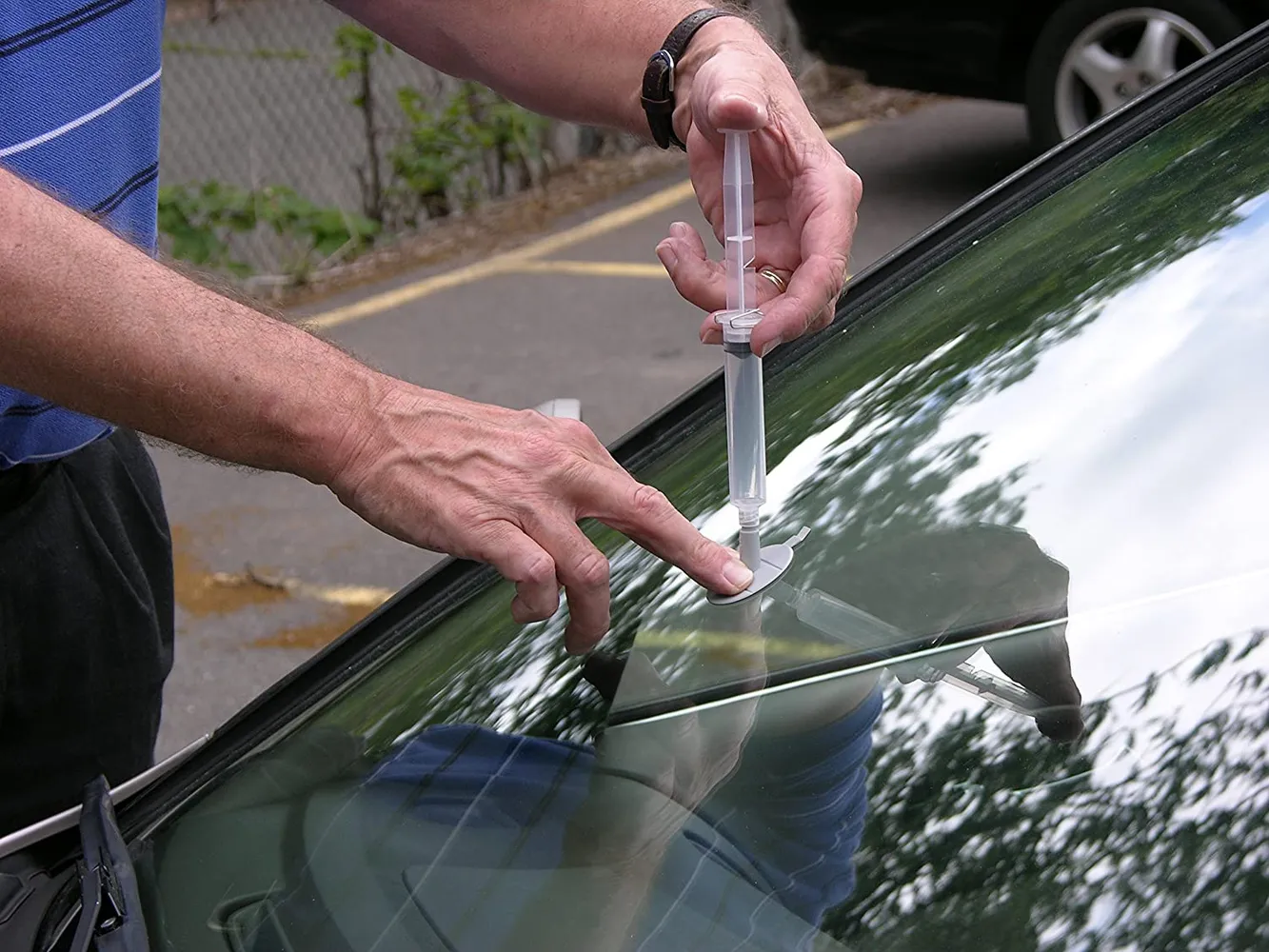 Signs of windshield damage requiring replacement